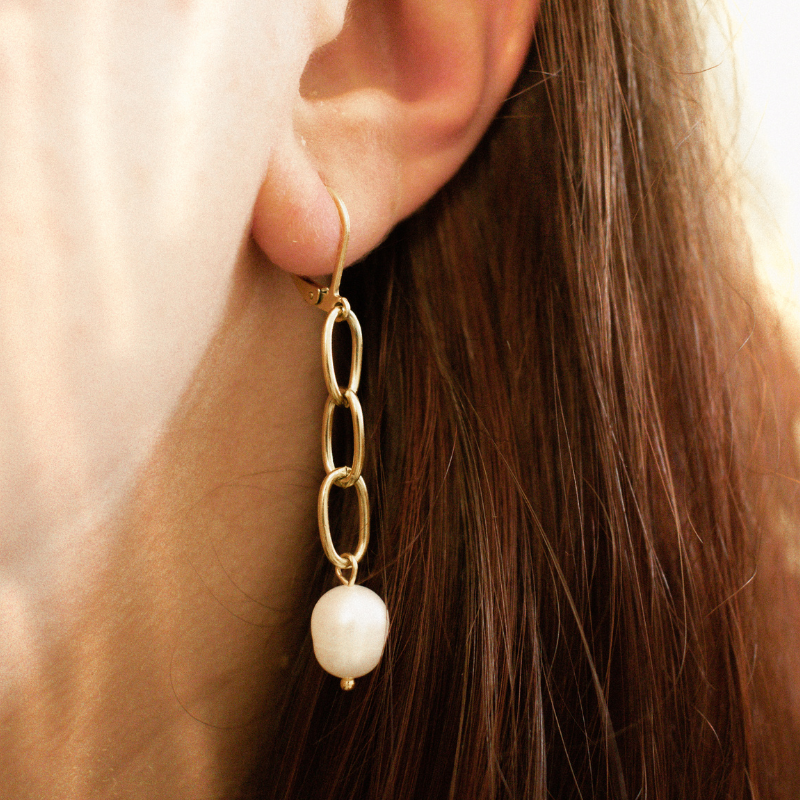 Boucles d'oreilles pendantes avec perle